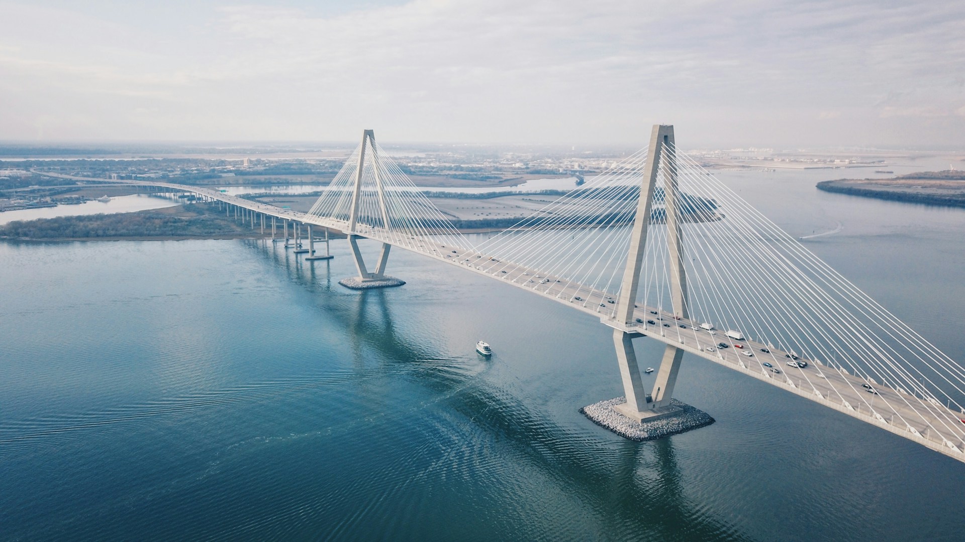 aerial view of bridge on the water in Charleston, SC