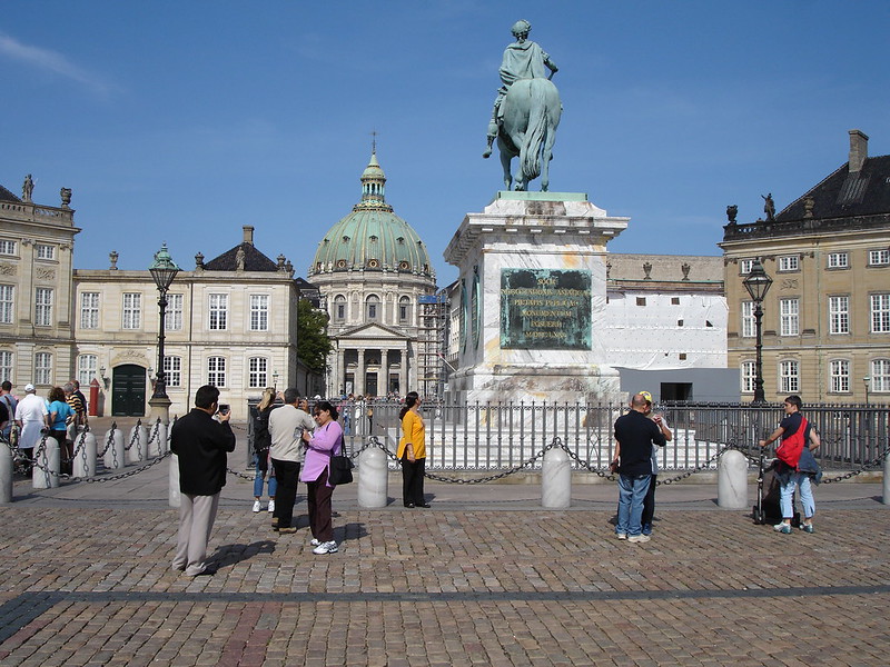 Tourists enjoying the view of Amalienborg castle