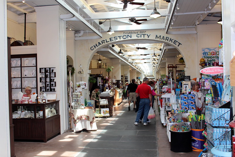 people enjoying shopping at the city market on East Bay Street, in Charleston SC