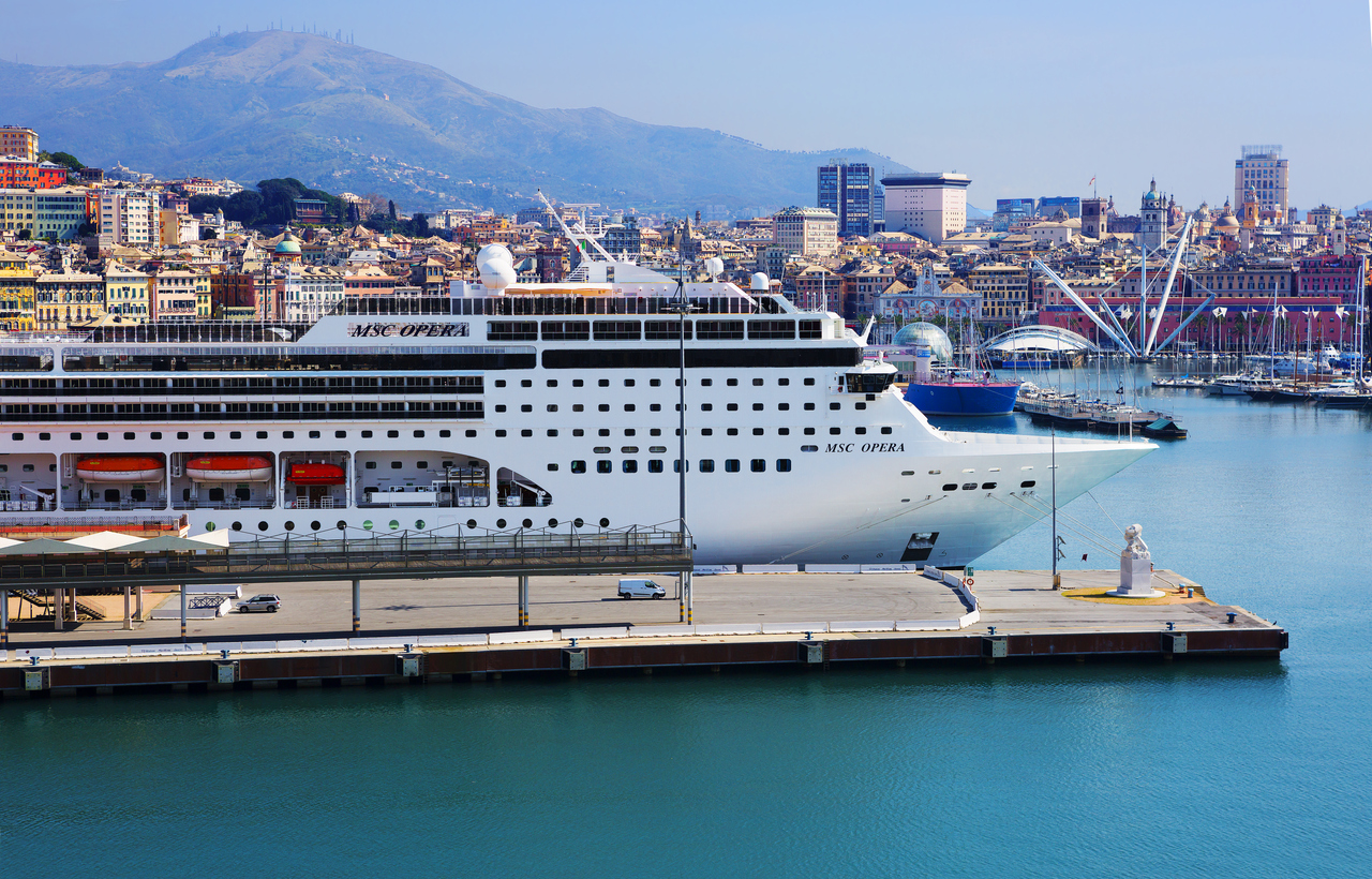 Marseille, France-March 21, 2020: city view from the sea. MSC Opera cruise ship arrives at the dock.