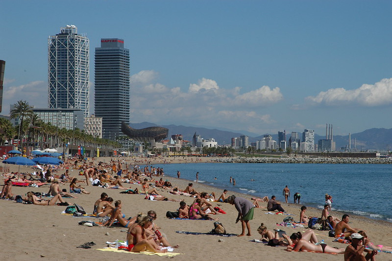 view of a crowded beach in Barcelona, Spain