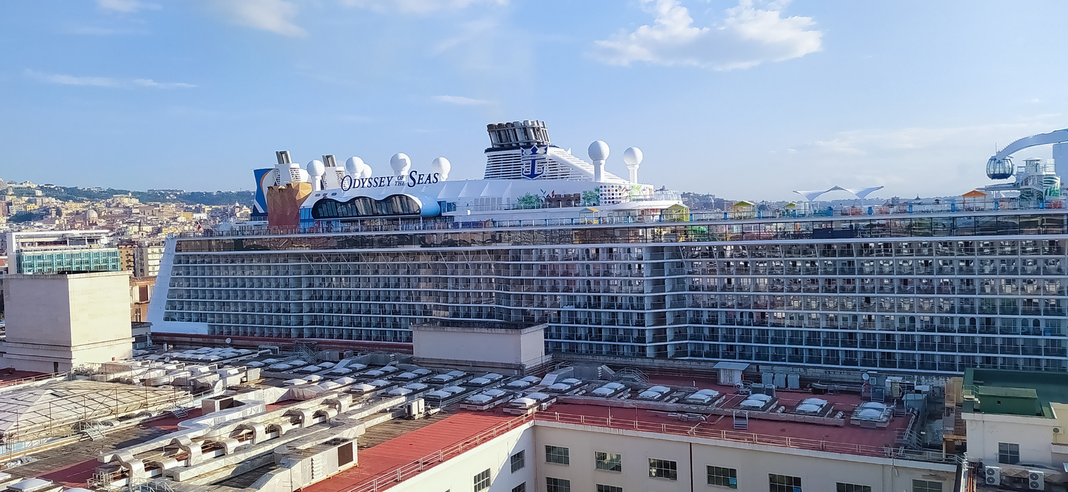 The new cruise ship Odyssey of the Seas by Royal Caribbean docked at cruise port Naples, Italy