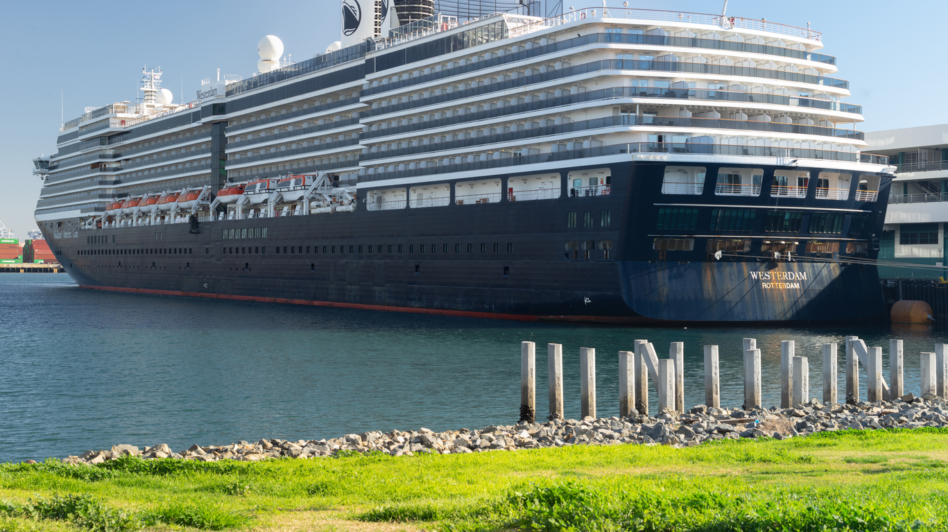 Image of a Holland America Line cruise ship shown docked at the Port of Los Angeles.