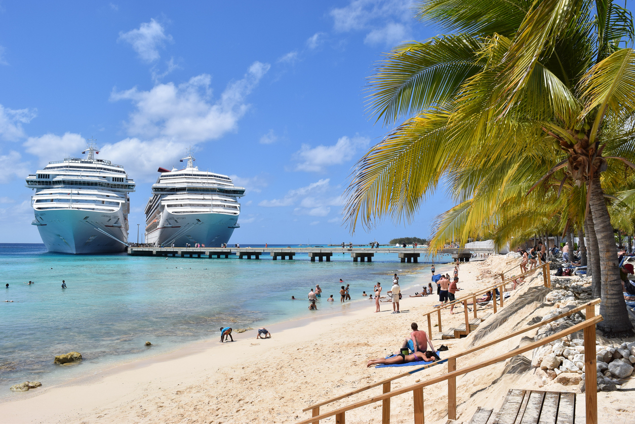 view of Two cruise ships docked next to each other from a beach in Grand Turks and Caicos
