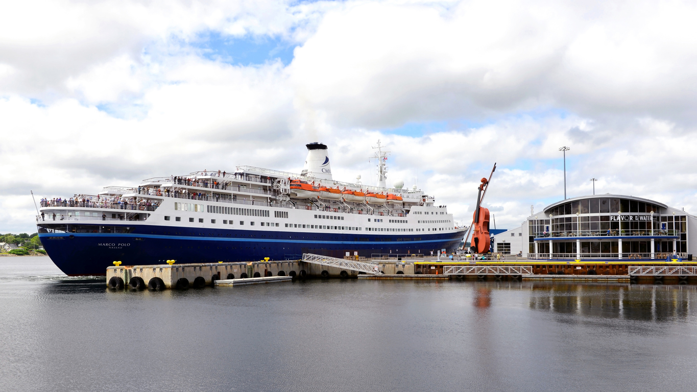 The MS Marco Polo pulling out of dock near the Joan Harris Cruise Pavilion, and the world’s largest fiddle in Sydney, NS.