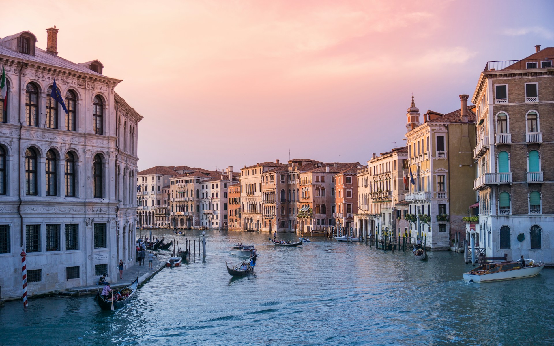 view of the canal and the buildings around it in Venice, Italy