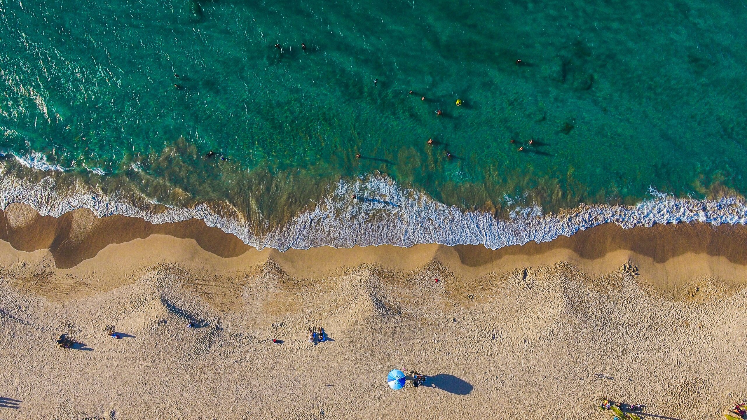 aerial view of Condado beach in the summertime