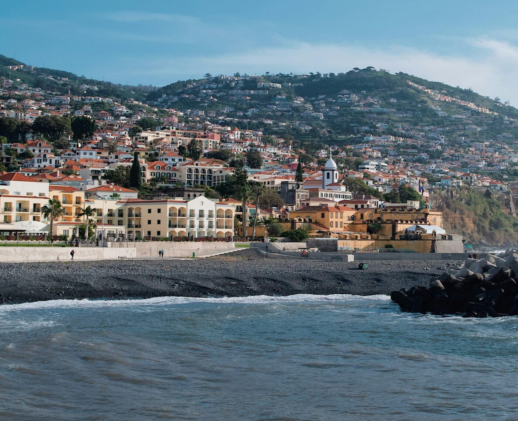 View of the coast of Funchal, Portugal from the ocean