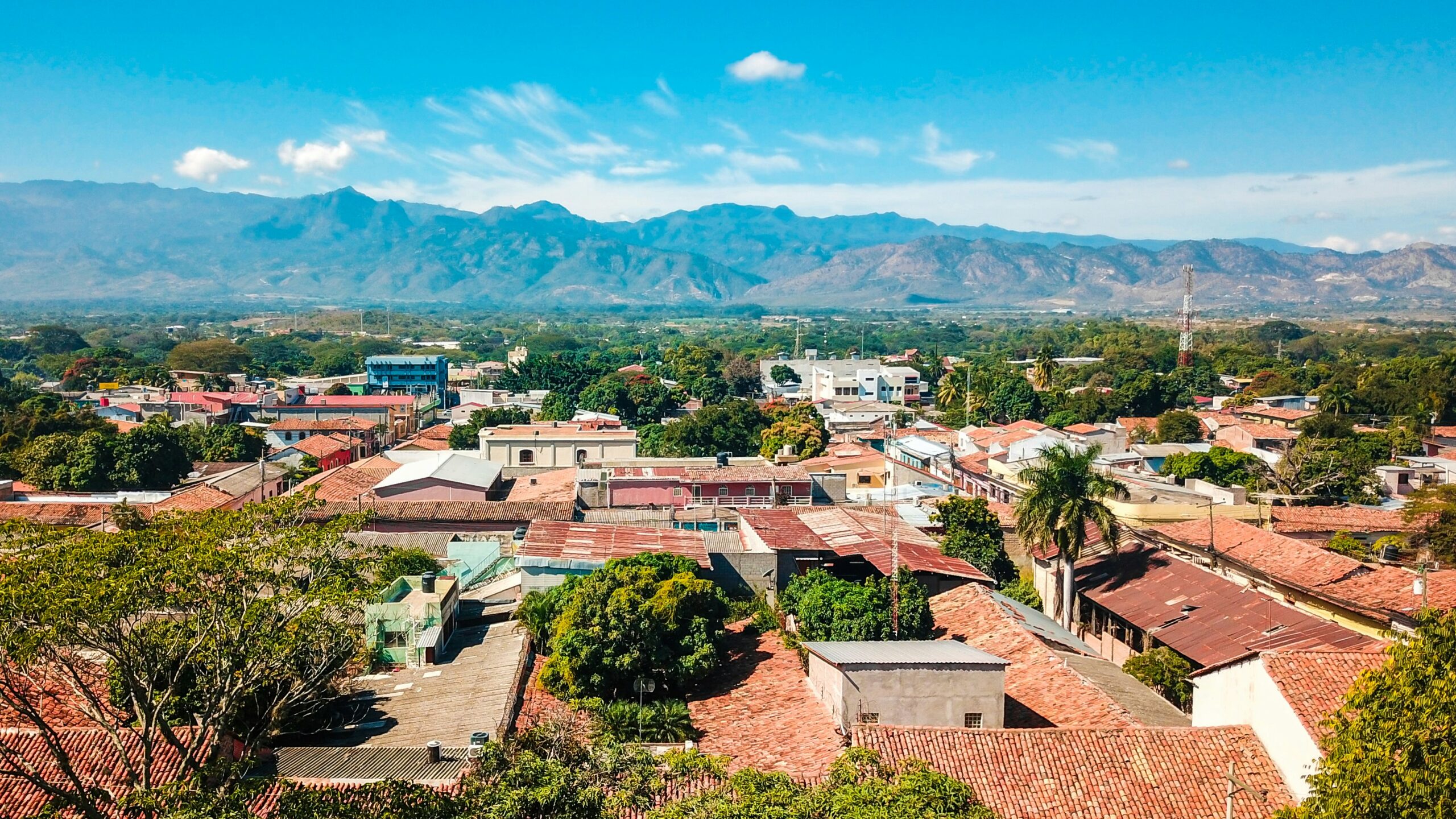 aerial view of Comayagua, Honduras with homes and mountains in the background
